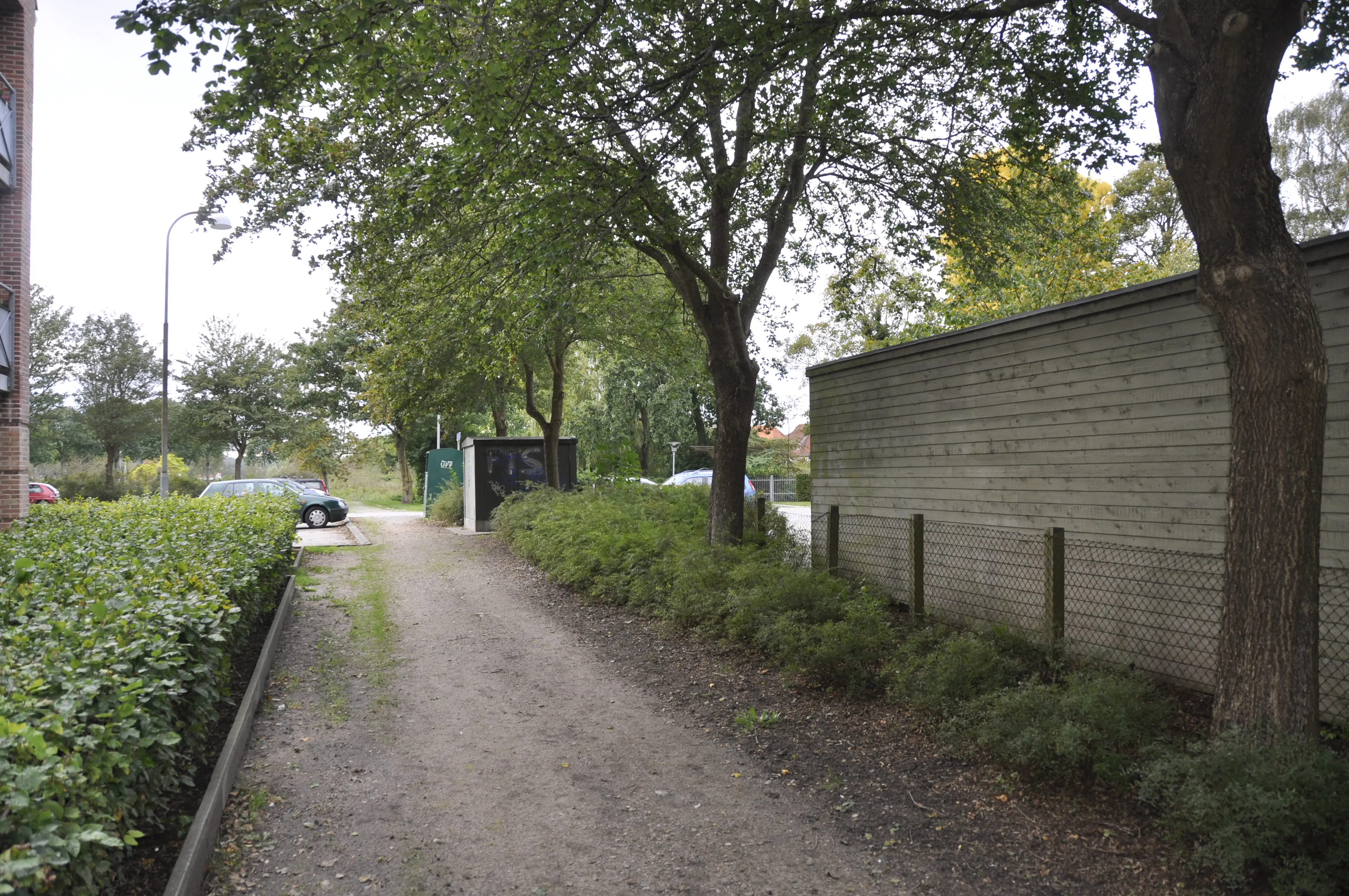 Billede af Aabenraa Sønderport Holdeplads, som lå til højre for træerne i midten af billedet.