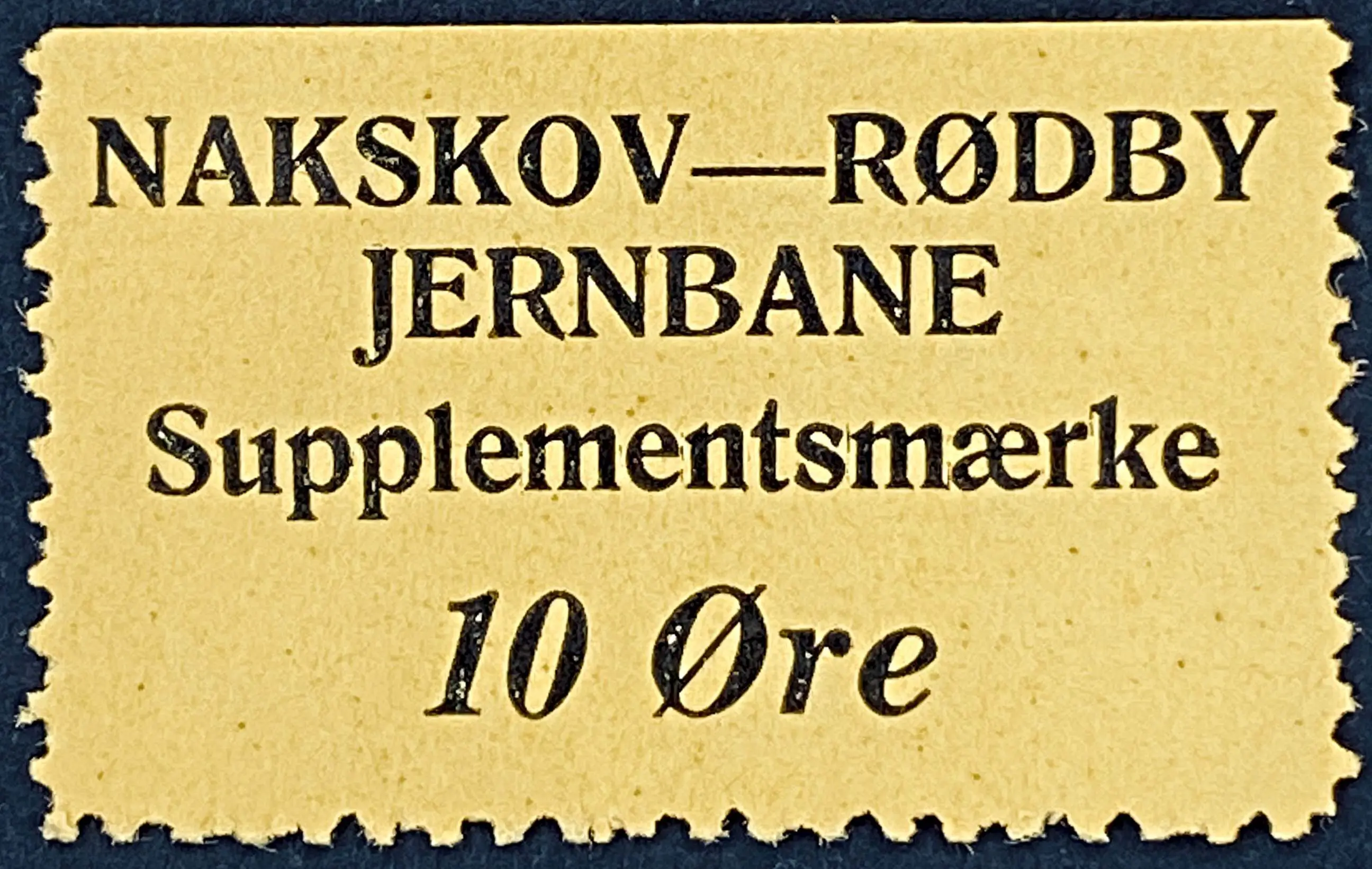 NRJ 18 - 10 Øre - Sort på gult papir.
