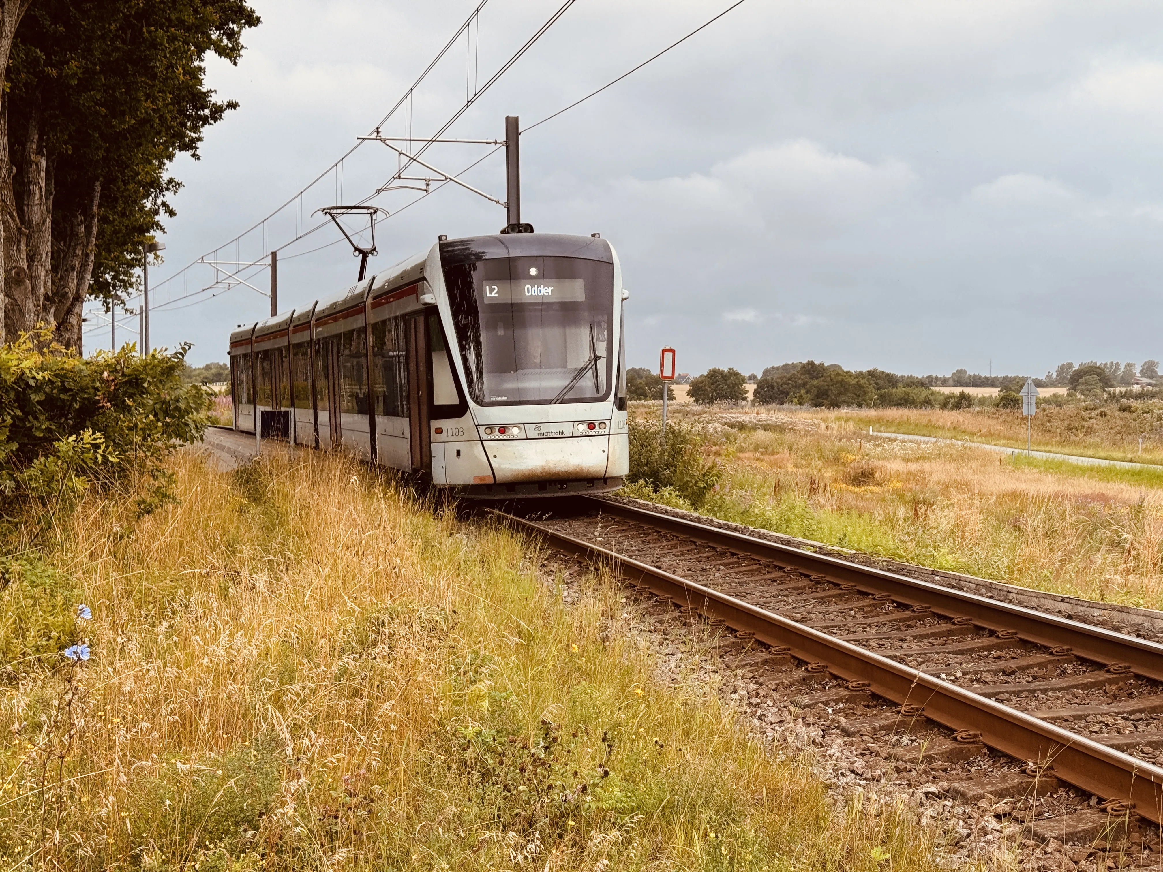 Billede af Aarhus Letbane togsæt 1103 fotograferet ud for Nørrevænget Letbanestation. Billede af Aarhus Letbane togsæt 1103 fotograferet ud for Nørrevænget Letbanestation.