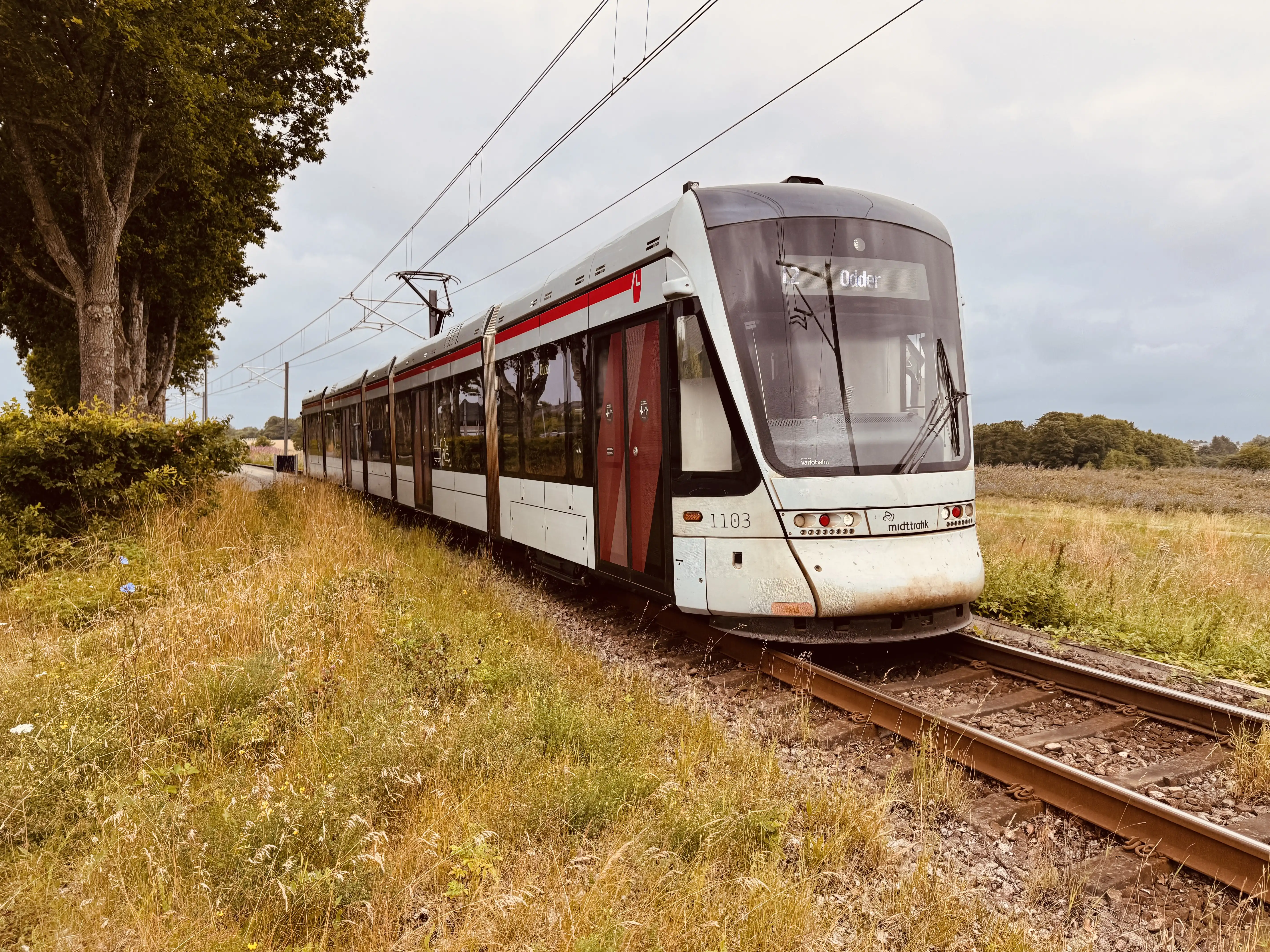 Billede af Aarhus Letbane togsæt 1103 fotograferet ud for Nørrevænget Letbanestation. Billede af Aarhus Letbane togsæt 1103 fotograferet ud for Nørrevænget Letbanestation.
